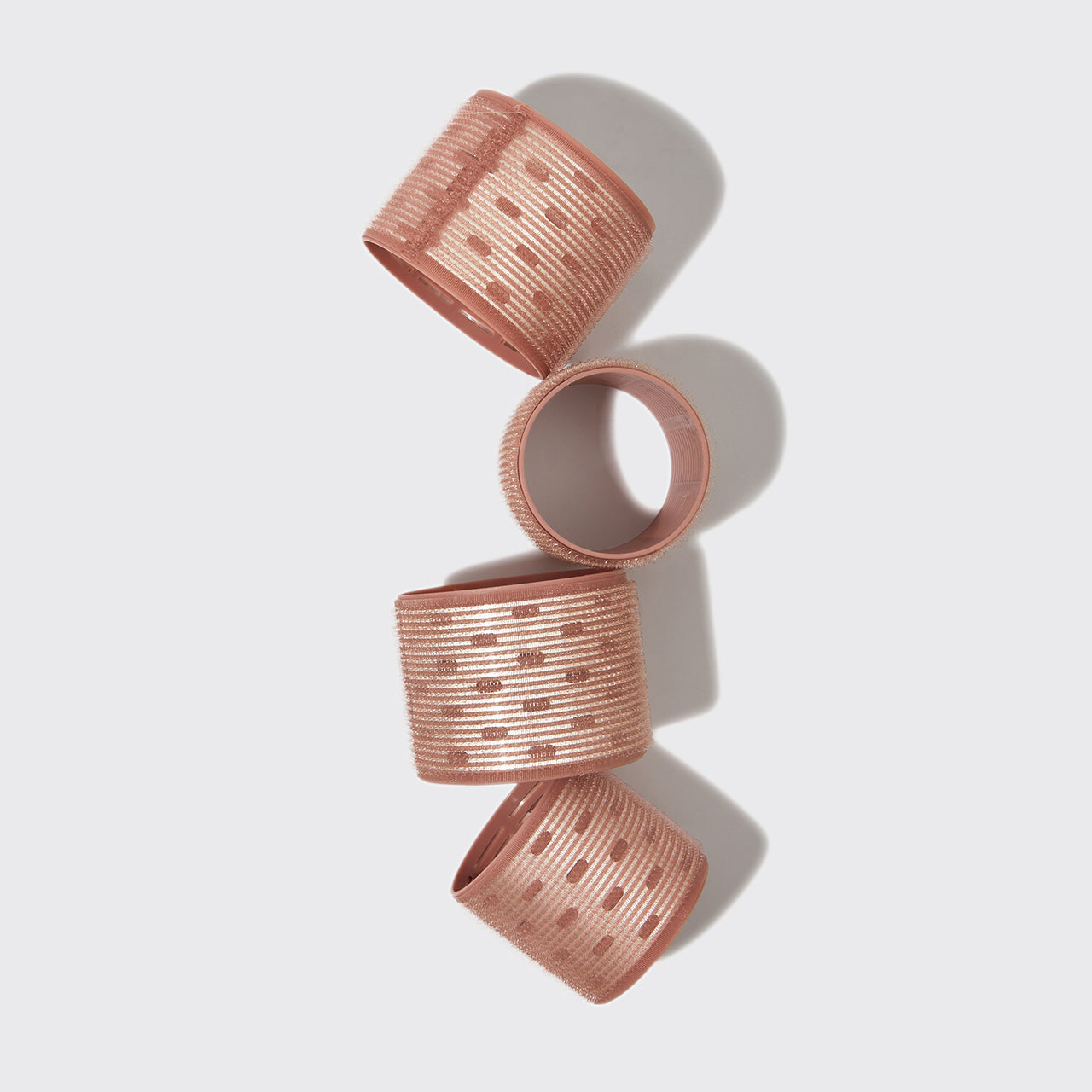 Close-up of Kitsch Terracotta XL Thermal Roller showing ceramic-coated core and self-gripping texture